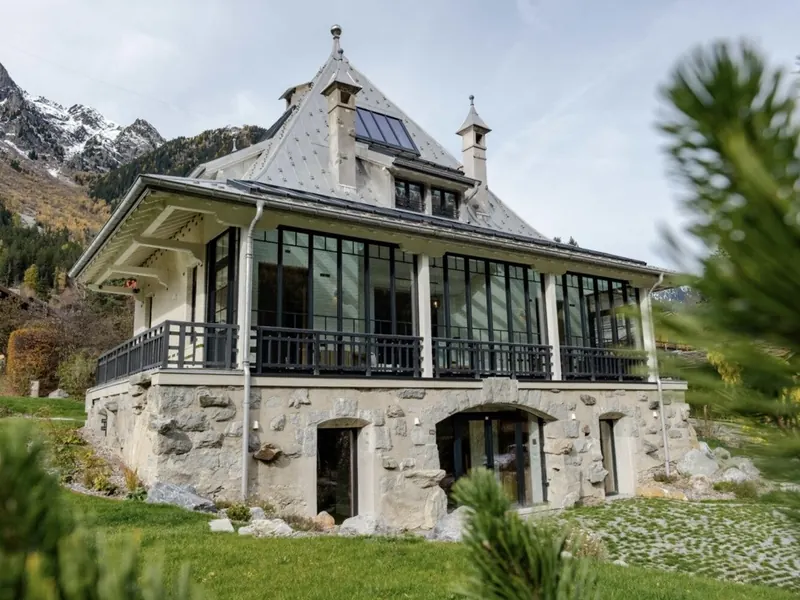 Villa Butterfly, a 1911 residence in stone and slate, its glazed veranda facing the peaks above Chamonix