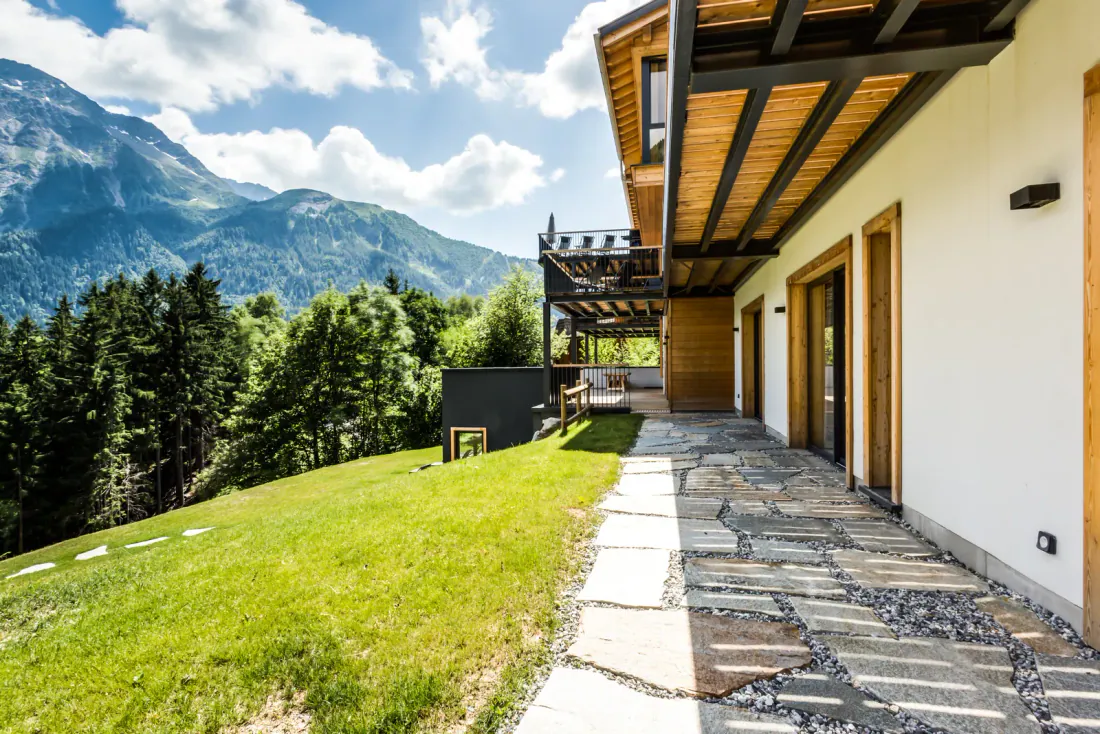 The chalet pool, the massif mirrored in the water
