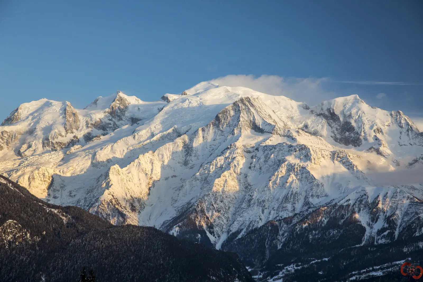 A high alpine peak wrapped in dramatic cloud